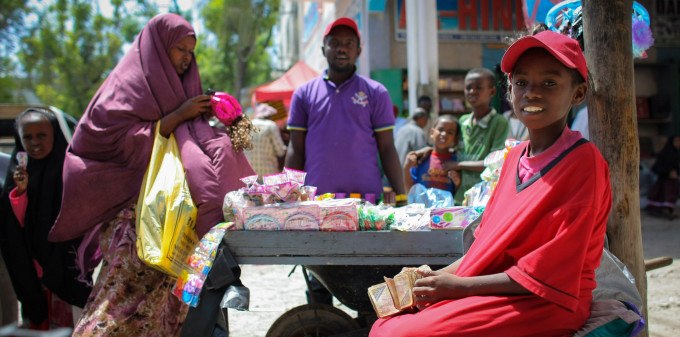 Woman shops at a road side stall in Hamar Weyne market, Mogadishu. 